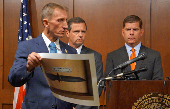 William Evans with a photo of the knife