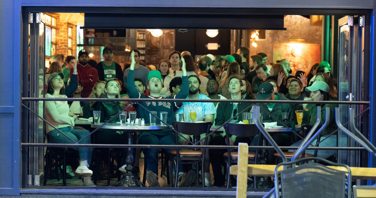 Disappointed fans at a Somerville bar