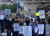 Protesters before the meeting in Jamaica Plain