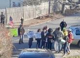 Bucket-drumming brigade outside Ricardo Arroyo's mother's house