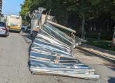 The remains of a truck shredded by a bridge on Soldiers Field Road