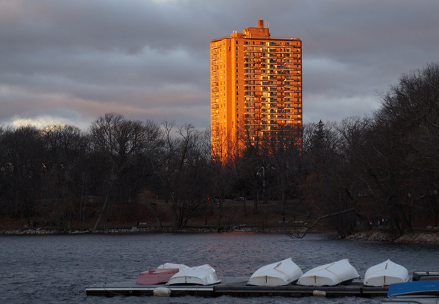 Orange apartment building at sunset