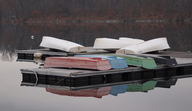 Boats mirrored in Jamaica Pond